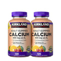 Two bottles of Kirkland Signature Adult Gummies Calcium on a white background