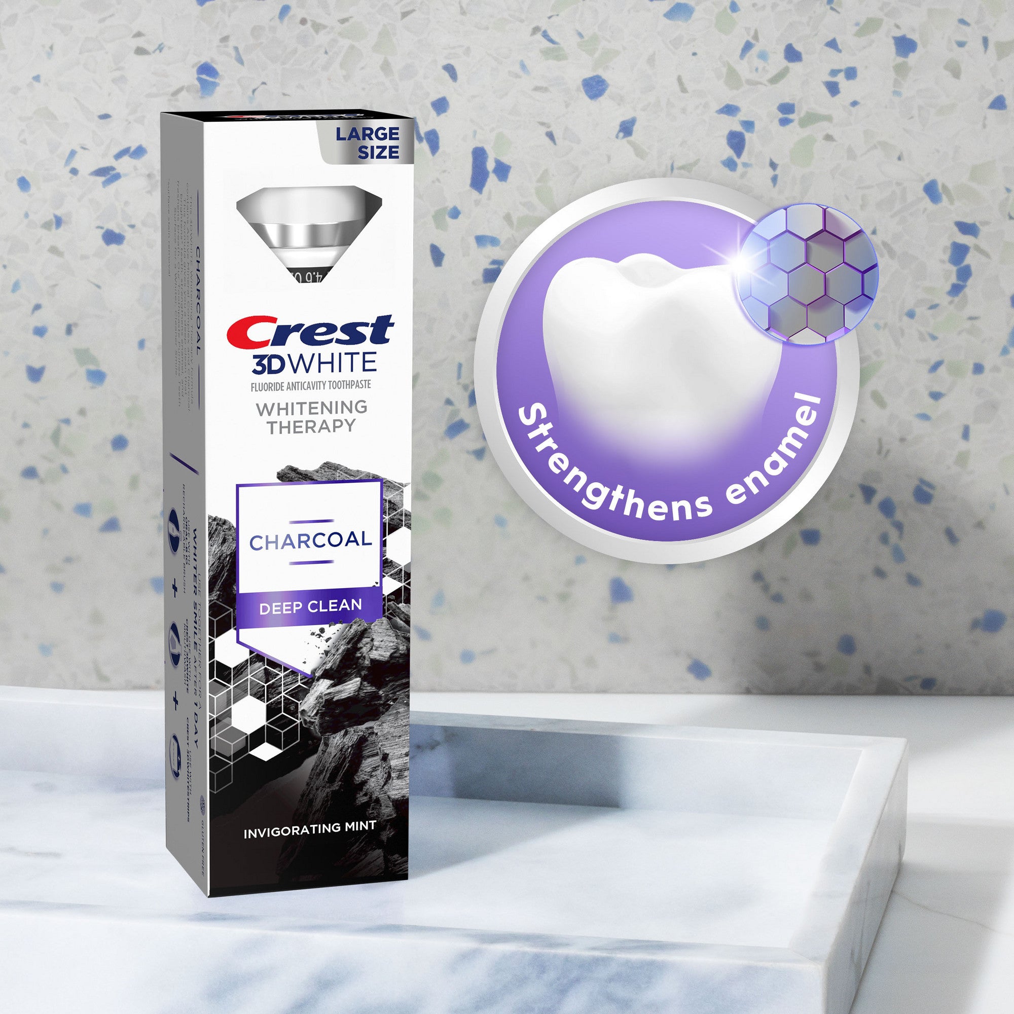 Crest 3D White Whitening Therapy Charcoal Deep Clean packaging on a textured gray background