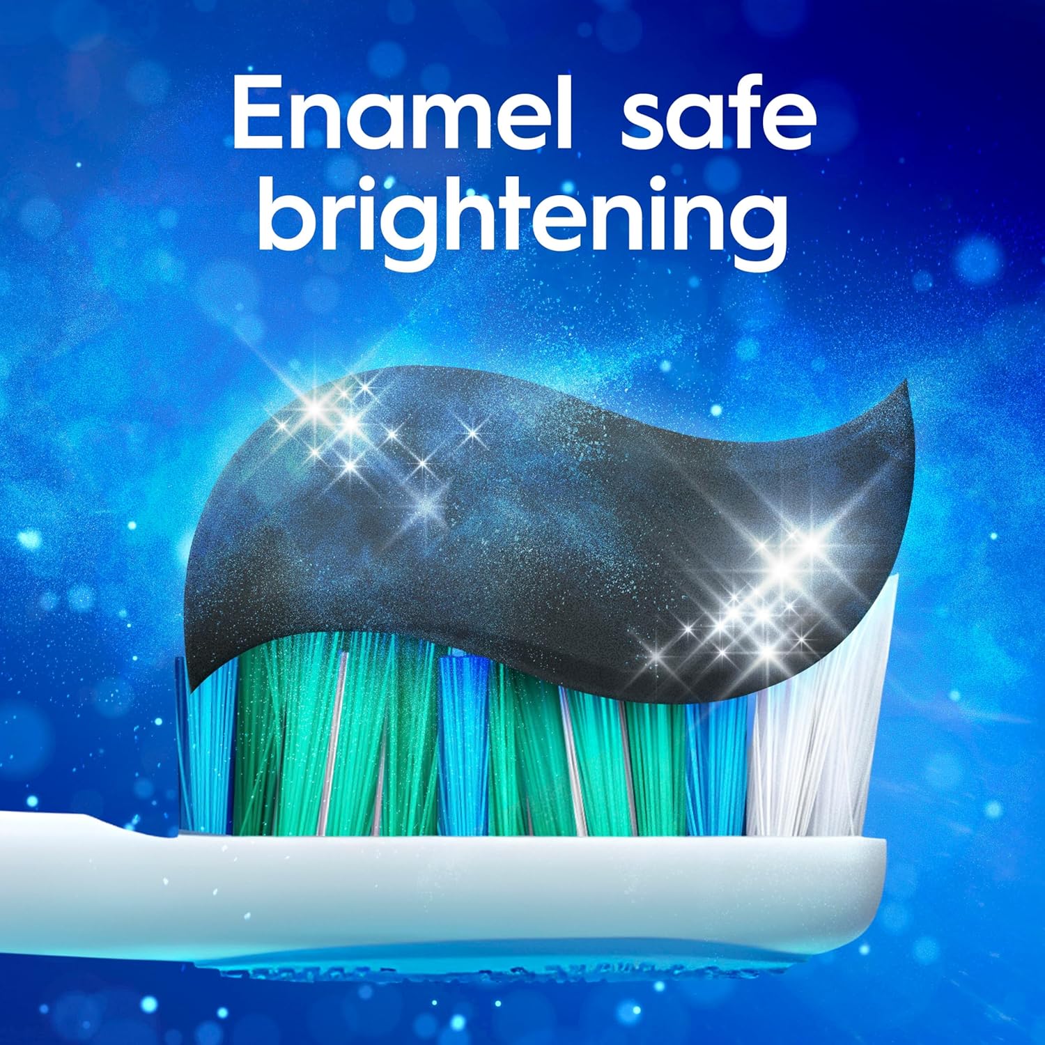 Toothbrush with blue bristles on a blue background, emphasizing 'Enamel safe brightening'.